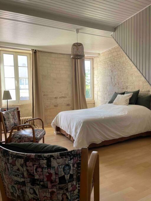 Maison Typique En Pierre De Caen - 4 Voyageurs Holiday home Louvigny